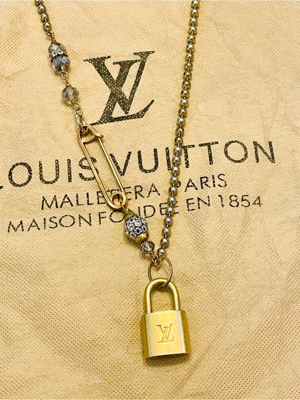 LOUIS VUITTON~RARE & UNIQUE 39" LV LOCK 311, Brass-Tone, Crystal Decor Necklace